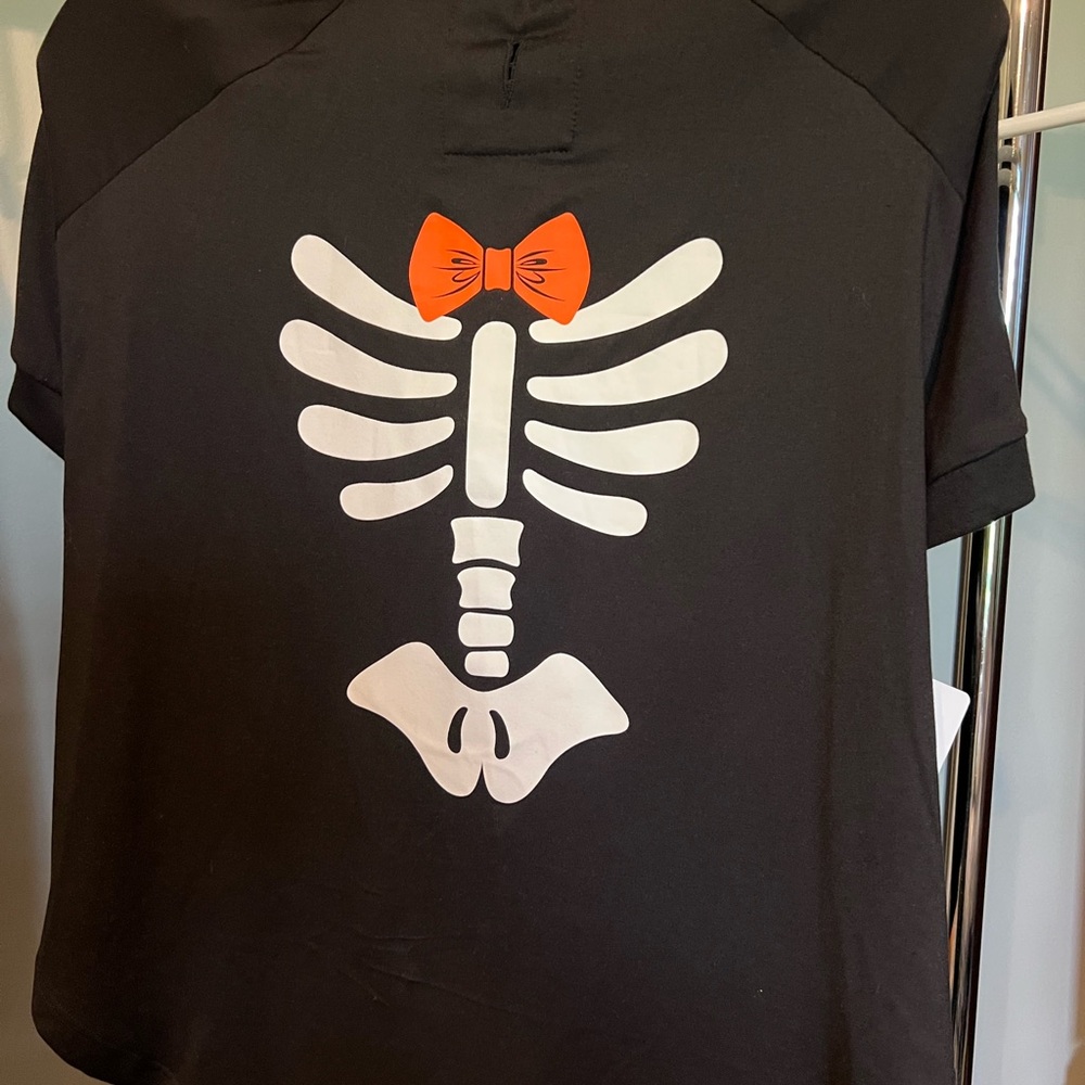 Black T-Shirt with Skeleton and Orange Bow Design